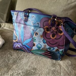 Anushka handpainted approximately 17 inches wide and 10 1/2 inches high